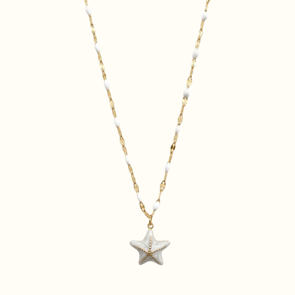 DUGO 18K gold-filled starfish pendant necklace with white enamel beads on a delicate chain for coastal style.