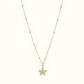 DUGO gold stainless steel starfish necklace with cubic zirconia stones on a delicate beaded chain