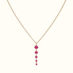 DUGO gold tennis five links necklace with five pink stones on a thin curb chain