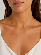 Woman wearing the DUGO gold Textured Lip Chain Y Lariat Necklace
