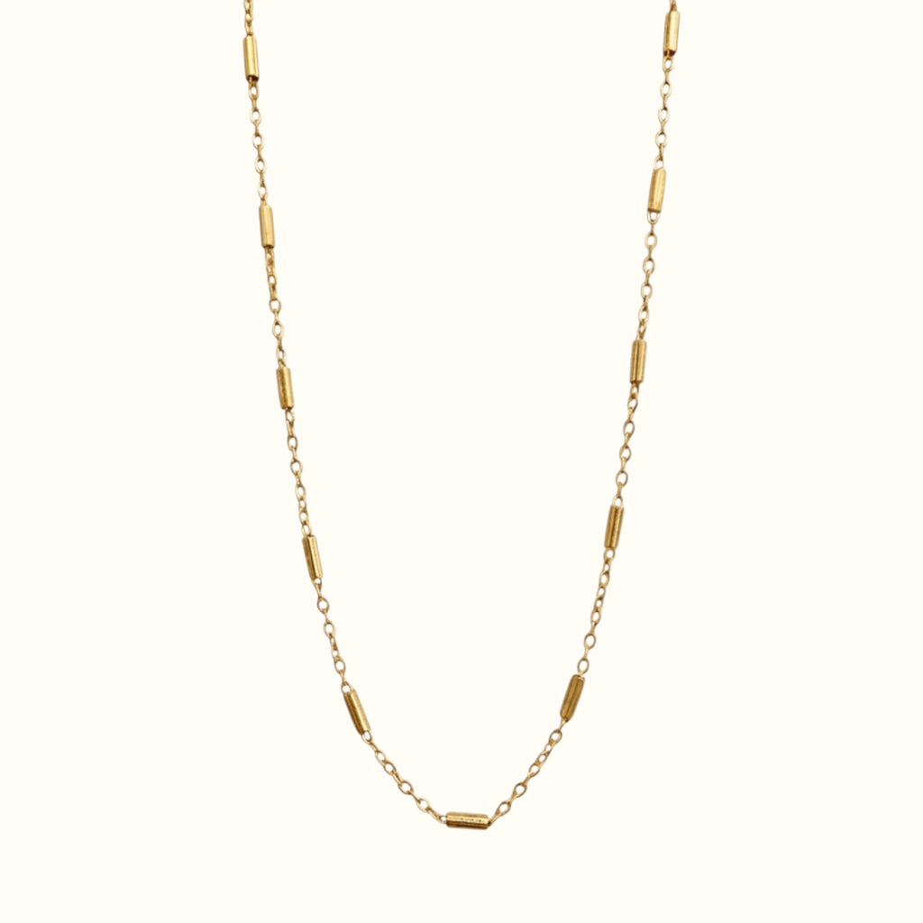 DUGO minimalist 18K gold filled stainless steel tube cable chain necklace with a waterproof, non-tarnish finish.