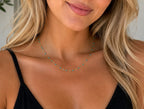 Woman wearing the DUGO gold turquoise Enamel Lip Chain Necklace