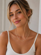 Close-up of the DUGO gold white Enamel Lip Chain Necklace worn on the neck