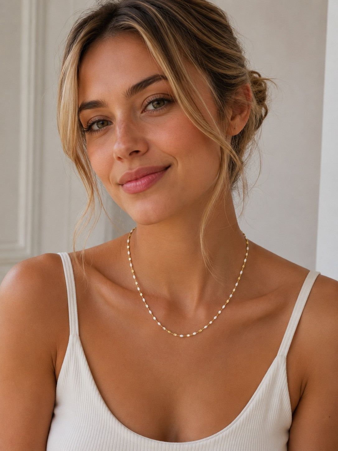 Close-up of the DUGO gold white Enamel Lip Chain Necklace worn on the neck