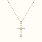 DUGO gold cross pendant necklace featuring sparkling zirconia stones on a delicate ball chain