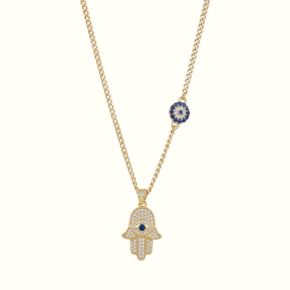 DUGO 18K gold filled Hamsa hand necklace with cubic zirconia, blue evil eye pendant, and matching charm on chain.