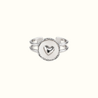 DUGO adjustable silver ring with a polished round centerpiece featuring a raised heart and a double-band design.