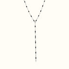 DUGO lariat necklace featuring a delicate silver chain accented with small black oval beads in a Y-shape design.