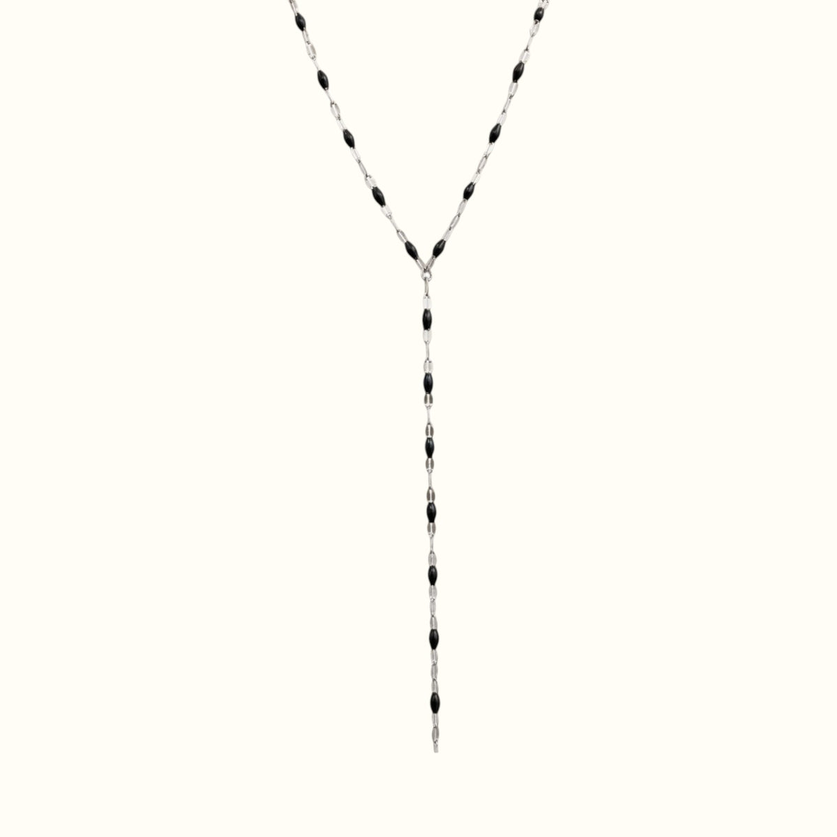 DUGO lariat necklace featuring a delicate silver chain accented with small black oval beads in a Y-shape design.