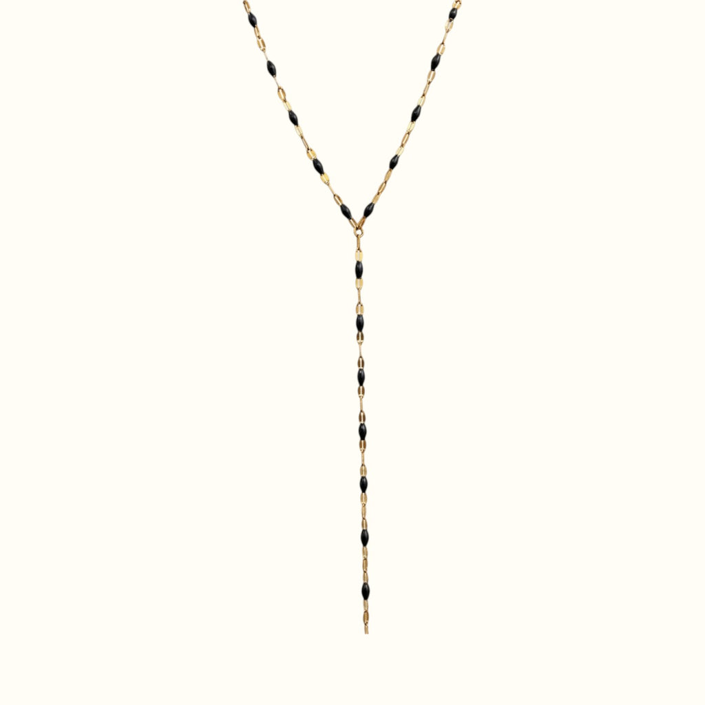 DUGO lariat necklace featuring a delicate gold chain accented with small black beads in a Y-shape design.