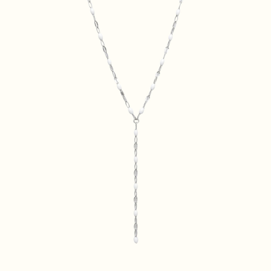 DUGO Lariat Lip Colors chain necklace featuring silver-tone links accented with small white enamel oval beads.