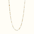 DUGO Lip Colors Chain necklace featuring gold-filled links accented with dainty white enamel beads