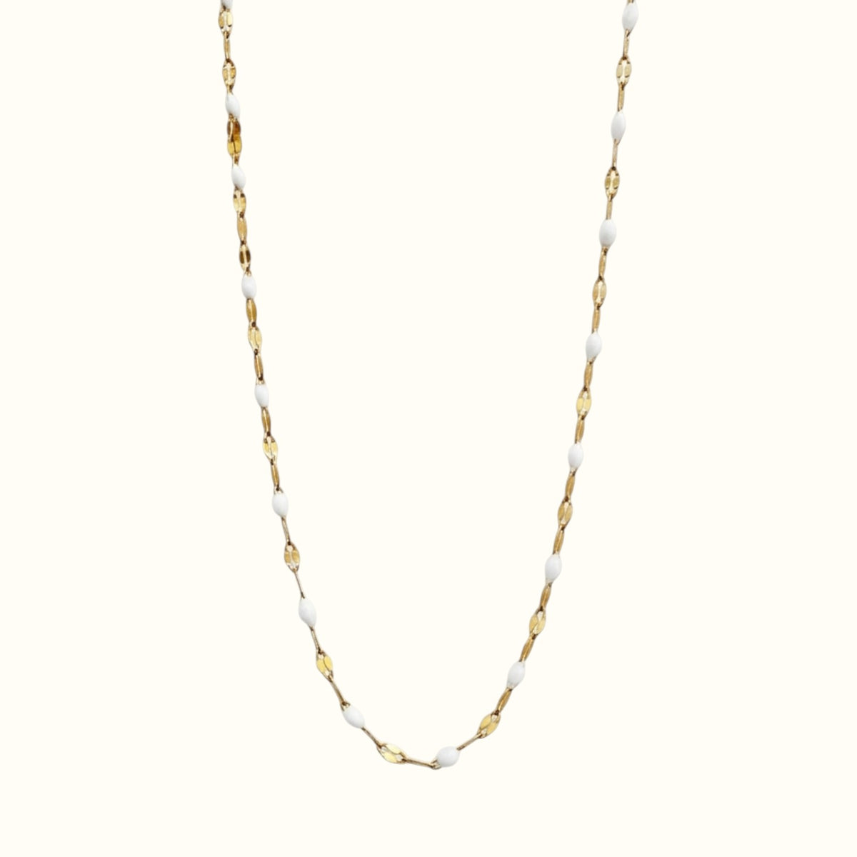 DUGO Lip Colors Chain necklace featuring gold-filled links accented with dainty white enamel beads