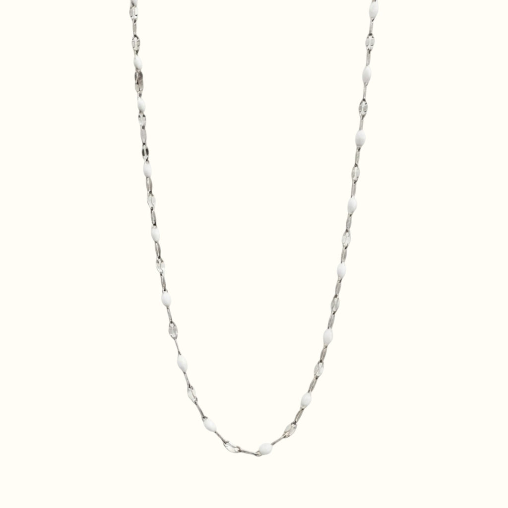 DUGO Lip Colors Chain necklace featuring white enamel beads on a polished silver stainless steel chain.