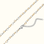 DUGO two-tone gold and silver mini open heart link chain necklace with a lobster clasp and adjustable extender.