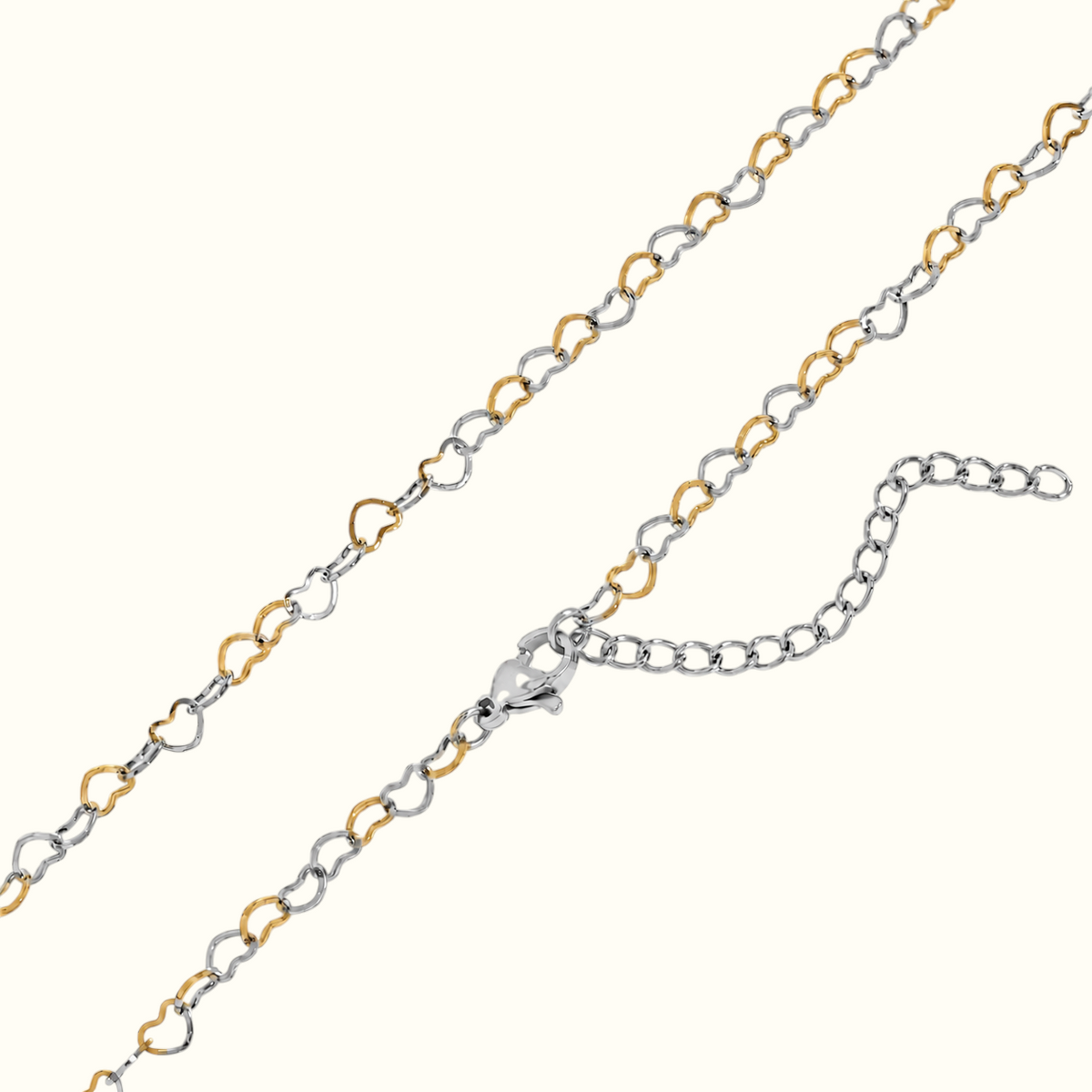 DUGO two-tone gold and silver mini open heart link chain necklace with a lobster clasp and adjustable extender.