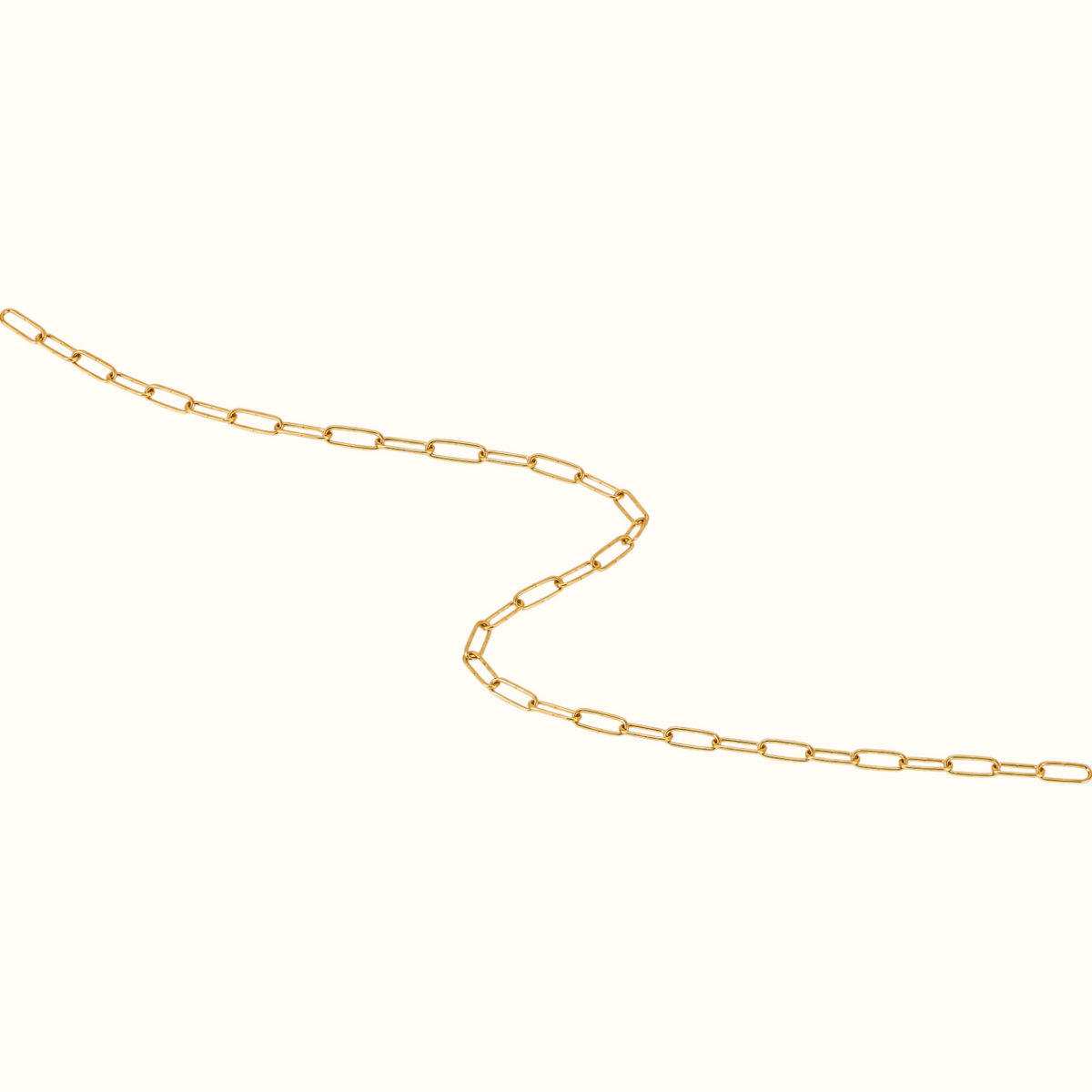 DUGO gold paperclip chain anklet with sleek elongated links in a minimalist style on a white background