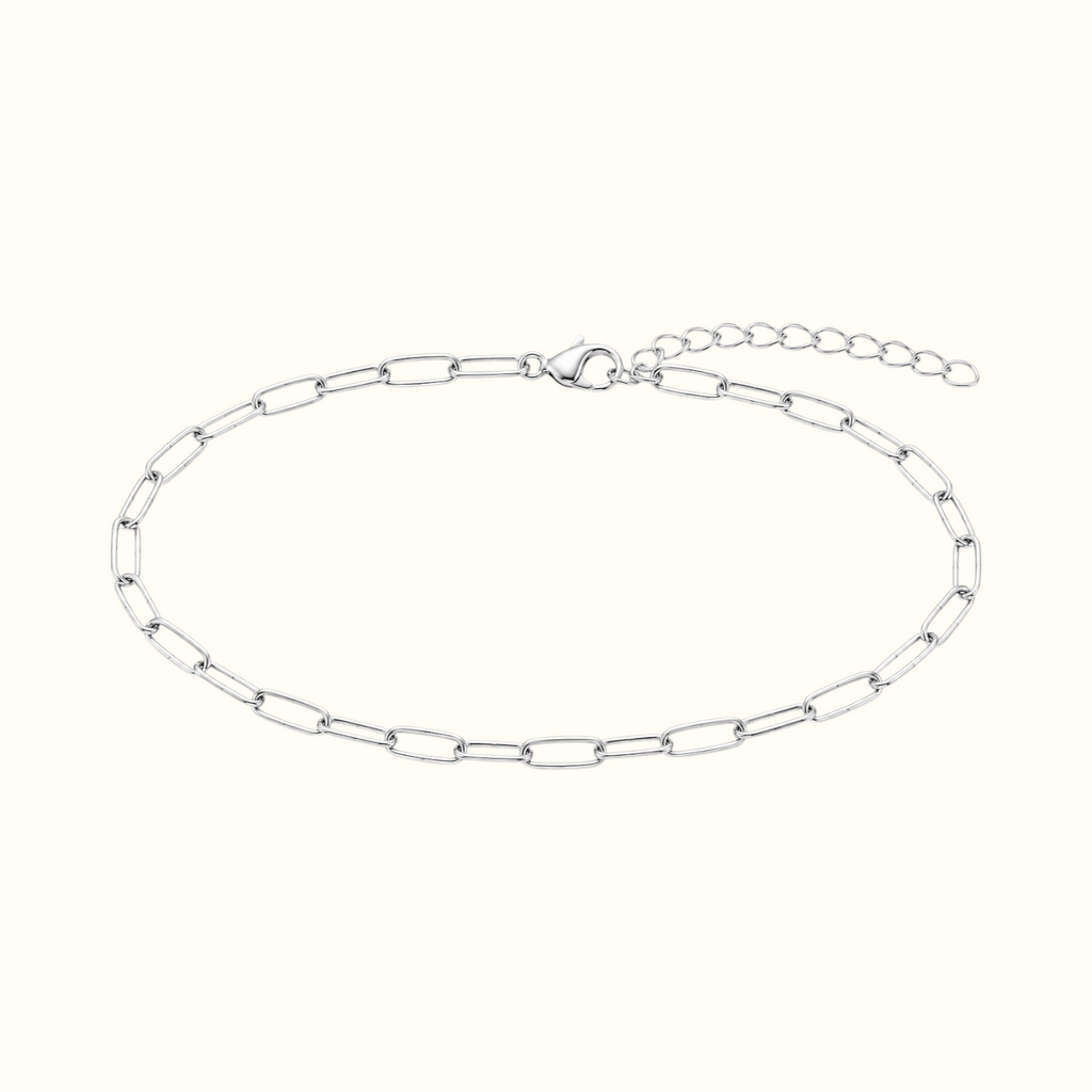 DUGO silver paperclip chain anklet with elongated links and a minimalist design on a white background