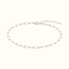 DUGO silver paperclip chain anklet with elongated links and a minimalist design on a white background