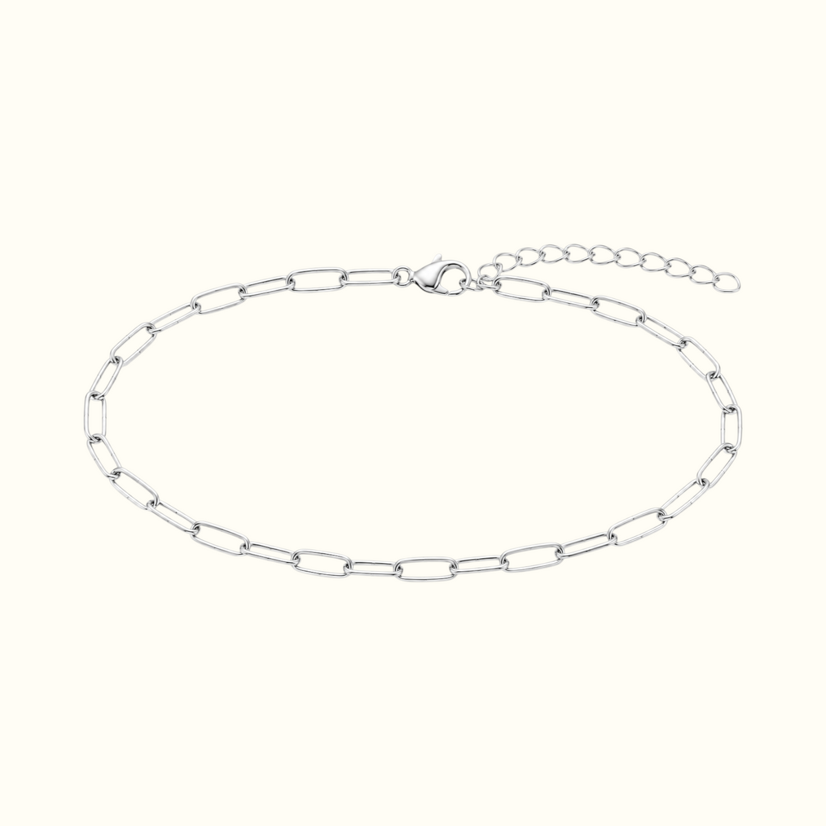 DUGO silver paperclip chain anklet with elongated links and a minimalist design on a white background