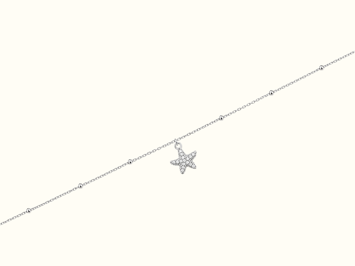 DUGO Starfish Anklet featuring a sparkling pavé starfish charm on a delicate silver-tone beaded stainless steel chain