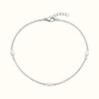 DUGO Pearl Trio Bracelet featuring three freshwater-style pearls on a delicate silver-tone stainless steel chain.
