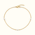 DUGO Pearl Trio Bracelet featuring three freshwater-style pearls on a delicate 18K gold-filled stainless steel chain.