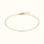 DUGO Pearl Trio Bracelet featuring three white freshwater-style pearls on a delicate 18K gold-filled stainless chain.