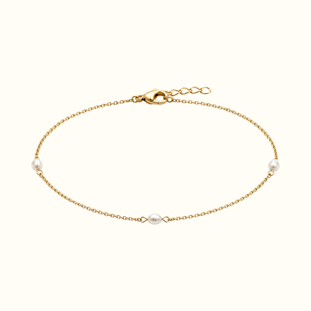 DUGO Pearl Trio Bracelet featuring three white freshwater-style pearls on a delicate 18K gold-filled stainless chain.