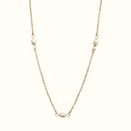 DUGO Pearl Trio necklace featuring three delicate white pearls on a fine 18K gold filled stainless steel chain