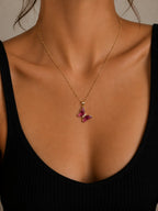 Woman wearing the DUGO pink Butterfly Lover Necklace