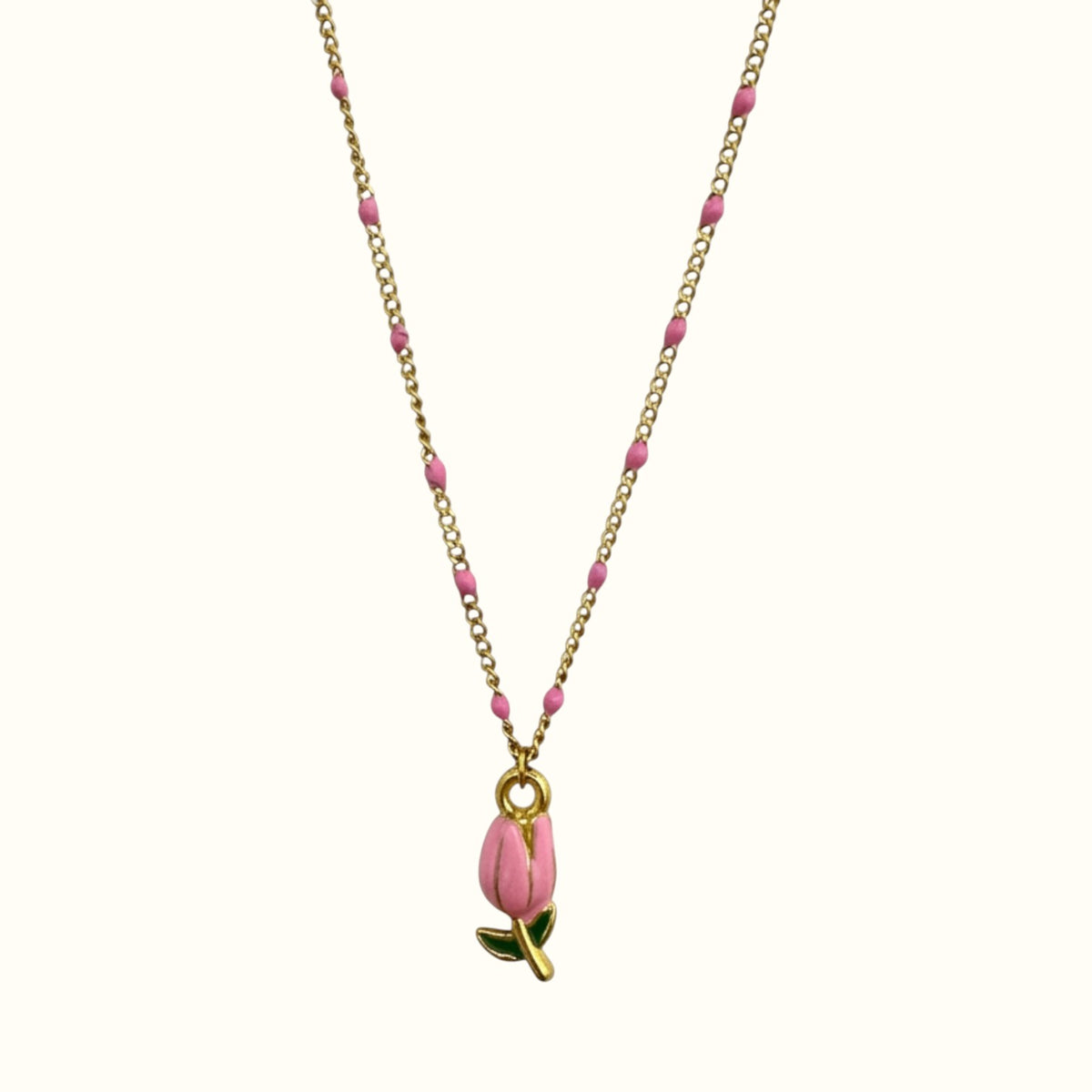 DUGO delicate 18K gold filled necklace featuring a pink tulip pendant and pink enamel accents on a gold chain