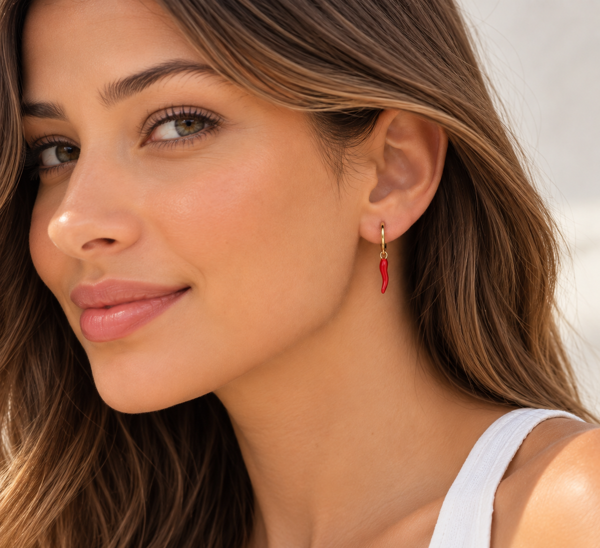 DUGO Red Italian Horn Earrings worn by a model