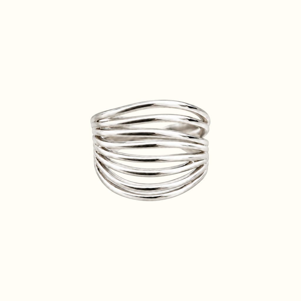 DUGO silver-toned adjustable dome ring featuring a modern sculptural design with layered ribbed detailing