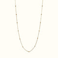DUGO minimalist satellite bead necklace in 18K gold filled, featuring a dainty cable chain with evenly spaced beads.