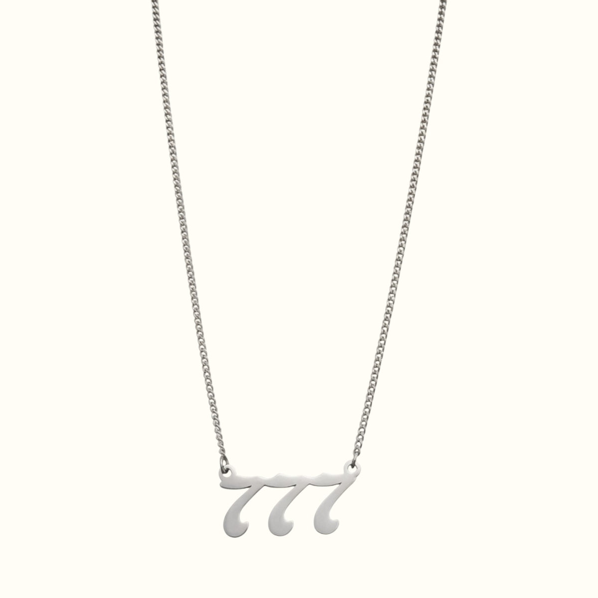 DUGO silver-tone Lucky Number 777 pendant necklace on a delicate curb chain against a light background
