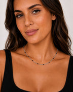 Close-up of the DUGO silver black Enamel Curb Chain Necklace worn on the neck