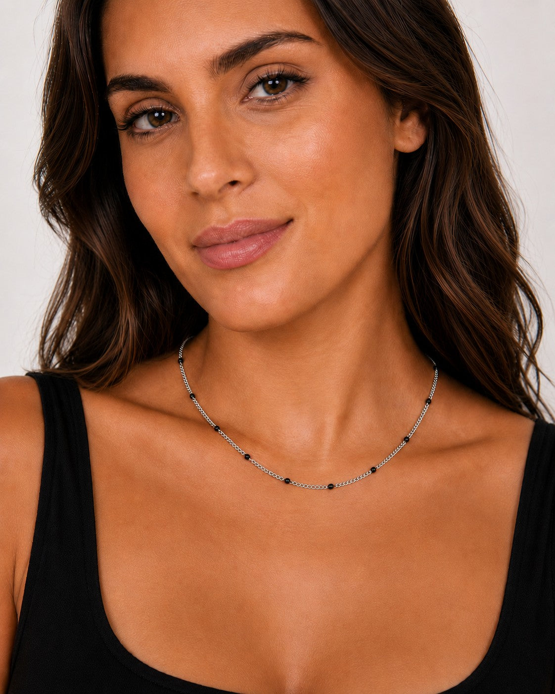 Close-up of the DUGO silver black Enamel Curb Chain Necklace worn on the neck