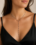 Woman wearing the DUGO silver black Enamel Y Lariat Necklace
