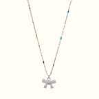 DUGO silver chain necklace featuring a mini bow pendant with sparkling zirconia stones and colorful enamel accents.