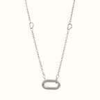 DUGO silver oval carabiner necklace featuring a delicate chain with small heart-shaped links.