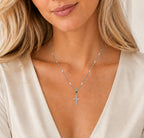 Woman wearing the DUGO silver Cross Cubic Zirconia Necklace