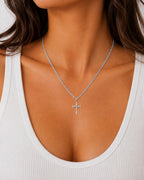 Woman wearing the DUGO silver Cross Dainty Necklace