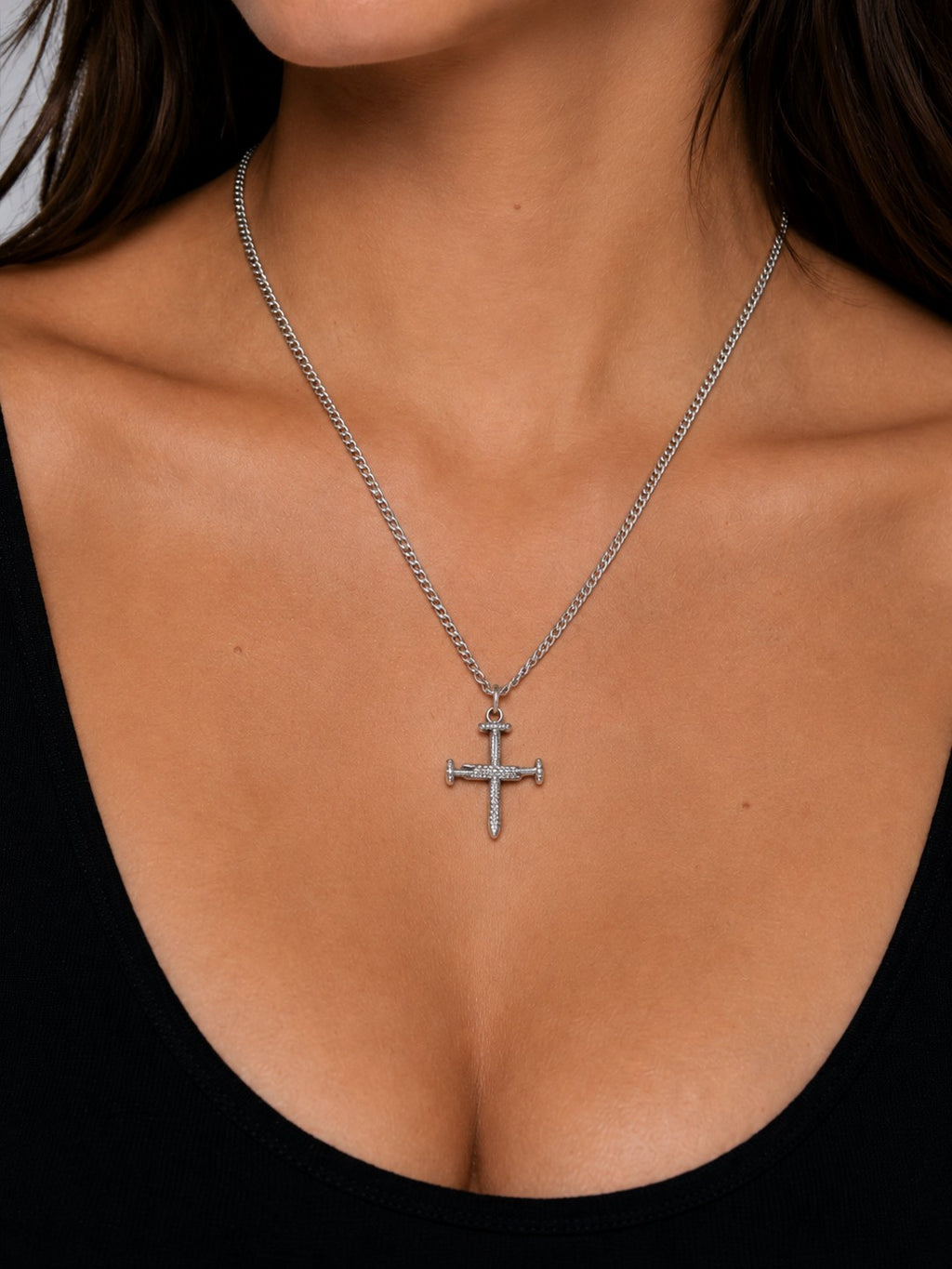 Woman wearing the DUGO silver Cross Nail Zirconia Necklace