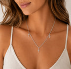 Woman wearing the DUGO silver Cross Trio Necklace