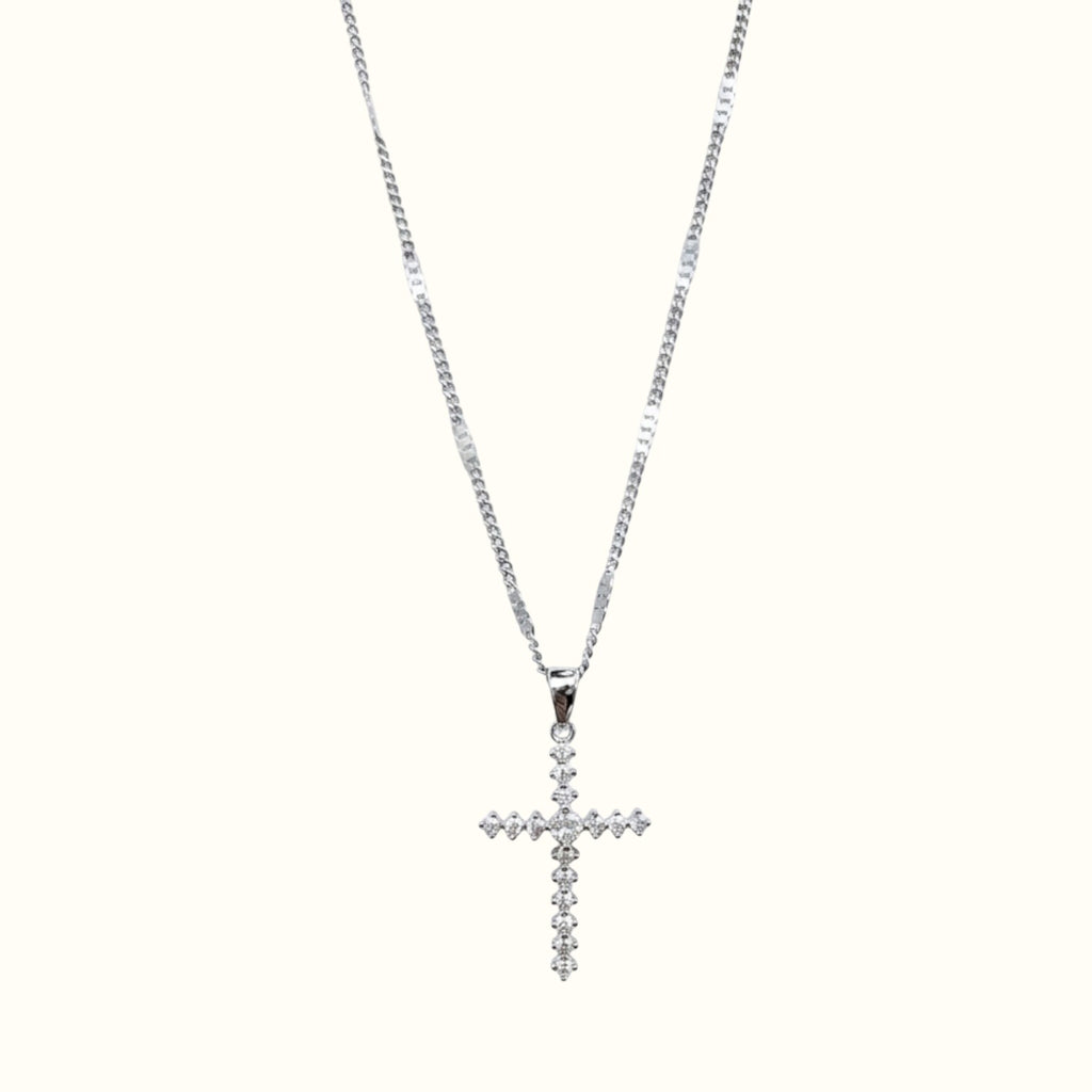DUGO silver-tone cross pendant necklace featuring sparkling cubic zirconia stones on a delicate chain
