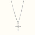 DUGO silver-tone cross pendant necklace featuring sparkling cubic zirconia stones on a delicate chain