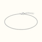 DUGO dainty silver curb chain bracelet made of polished stainless steel with a lobster clasp and extender chain.