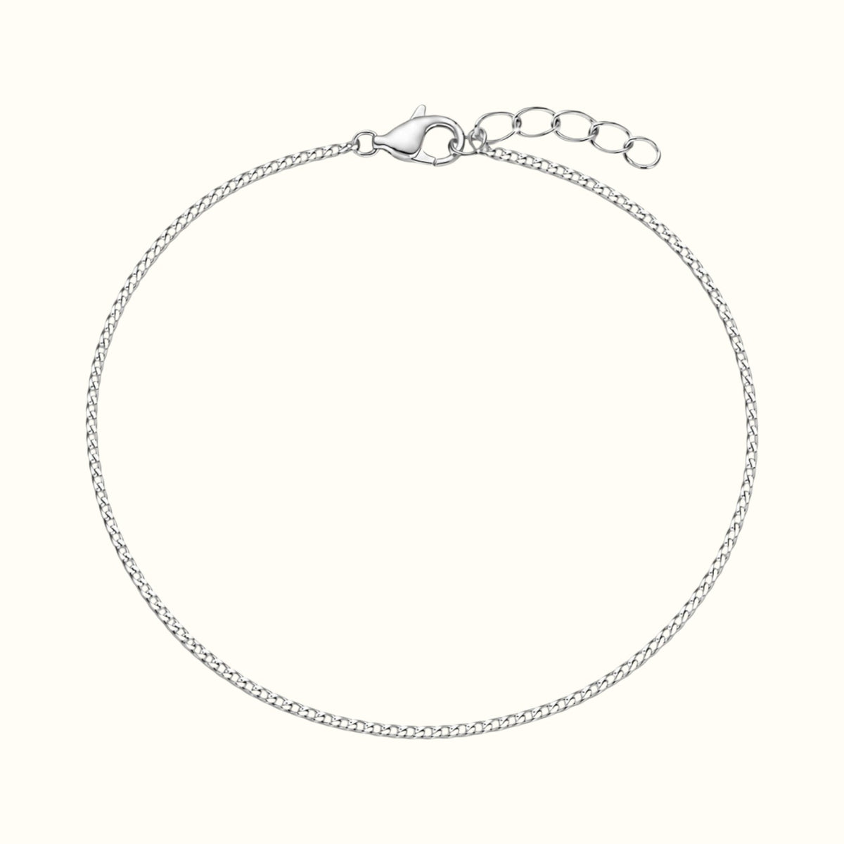DUGO dainty silver stainless steel curb chain bracelet with a lobster clasp and extender chain.