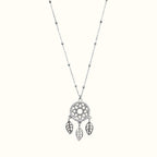 DUGO silver-tone dreamcatcher necklace with cubic zirconia accents and delicate leaf charms on a beaded chain.